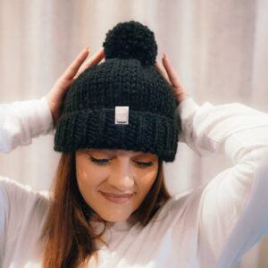 She Rex wool beanie with pom