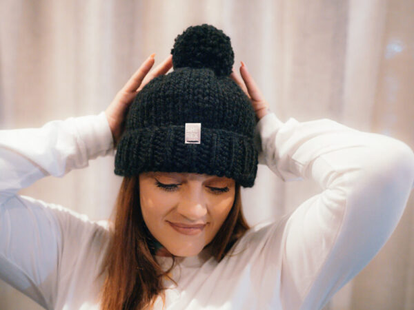 She Rex wool beanie with pom